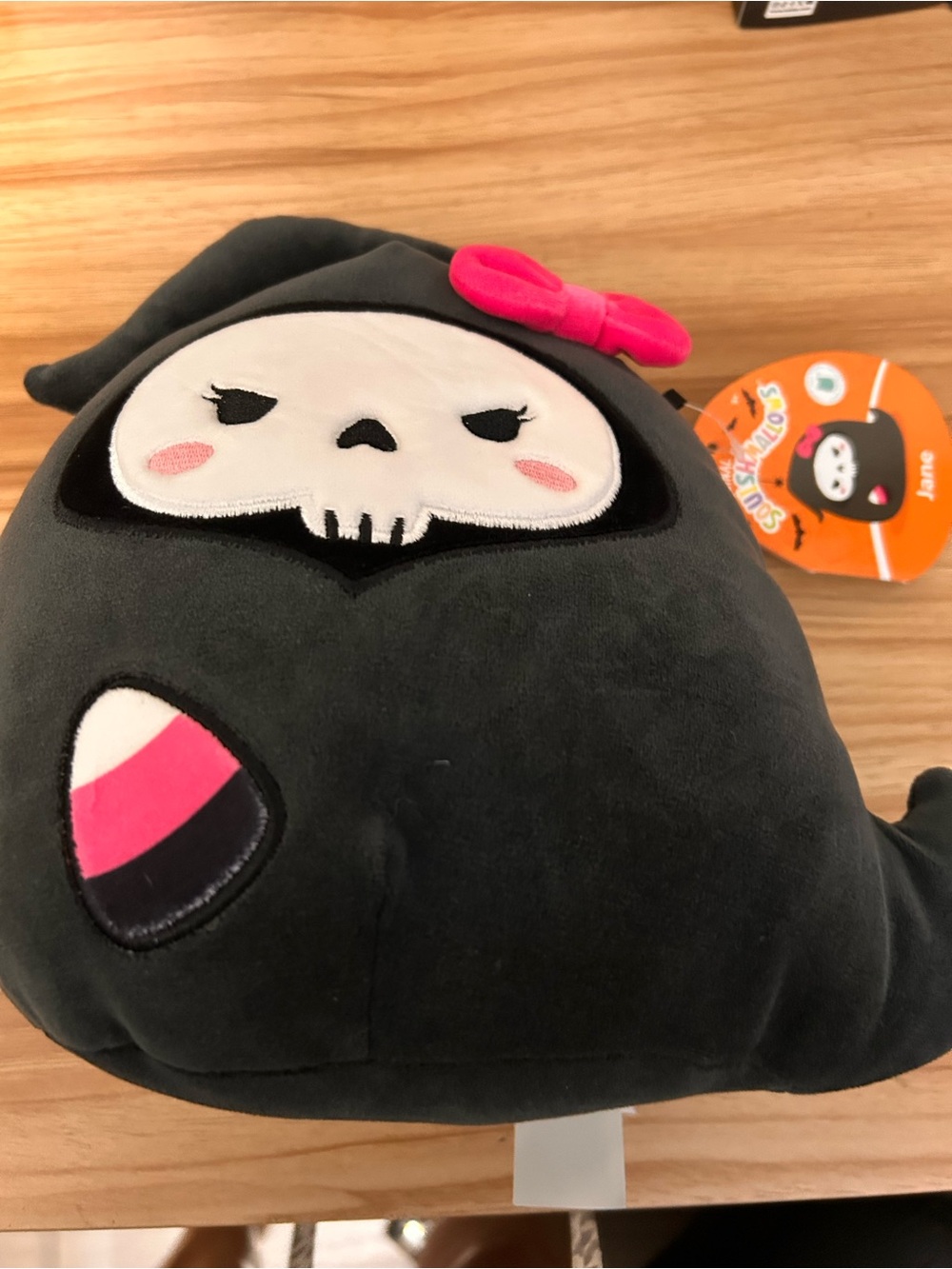 Squishmallows Black Plush Skull with Pink Bow Accent